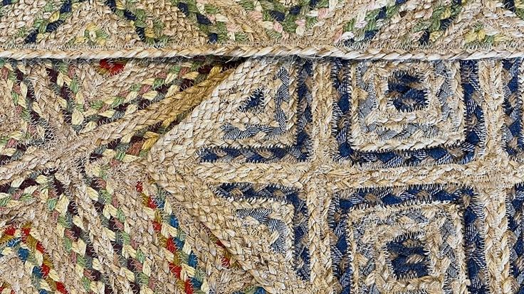 Image may contain: Home Decor, Rug, Pattern, Art, and Quilt