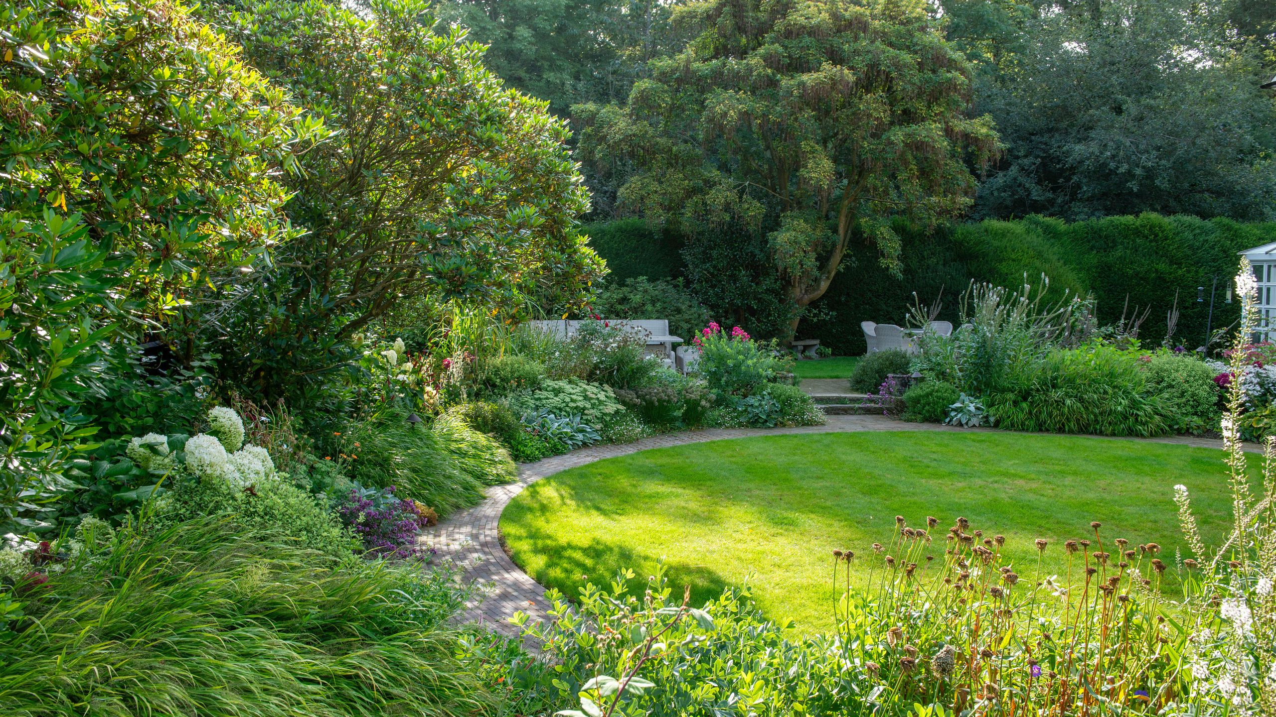 Image may contain: Garden, Nature, Outdoors, Grass, Plant, Park, Backyard, Yard, Vegetation, Lawn, Tree, Land, and Woodland