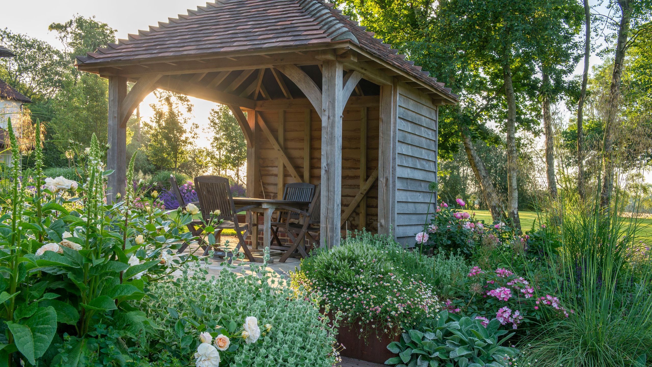 Image may contain: Indoors, Interior Design, Garden, Nature, Outdoors, Backyard, Yard, Herbal, Herbs, Plant, and Chair