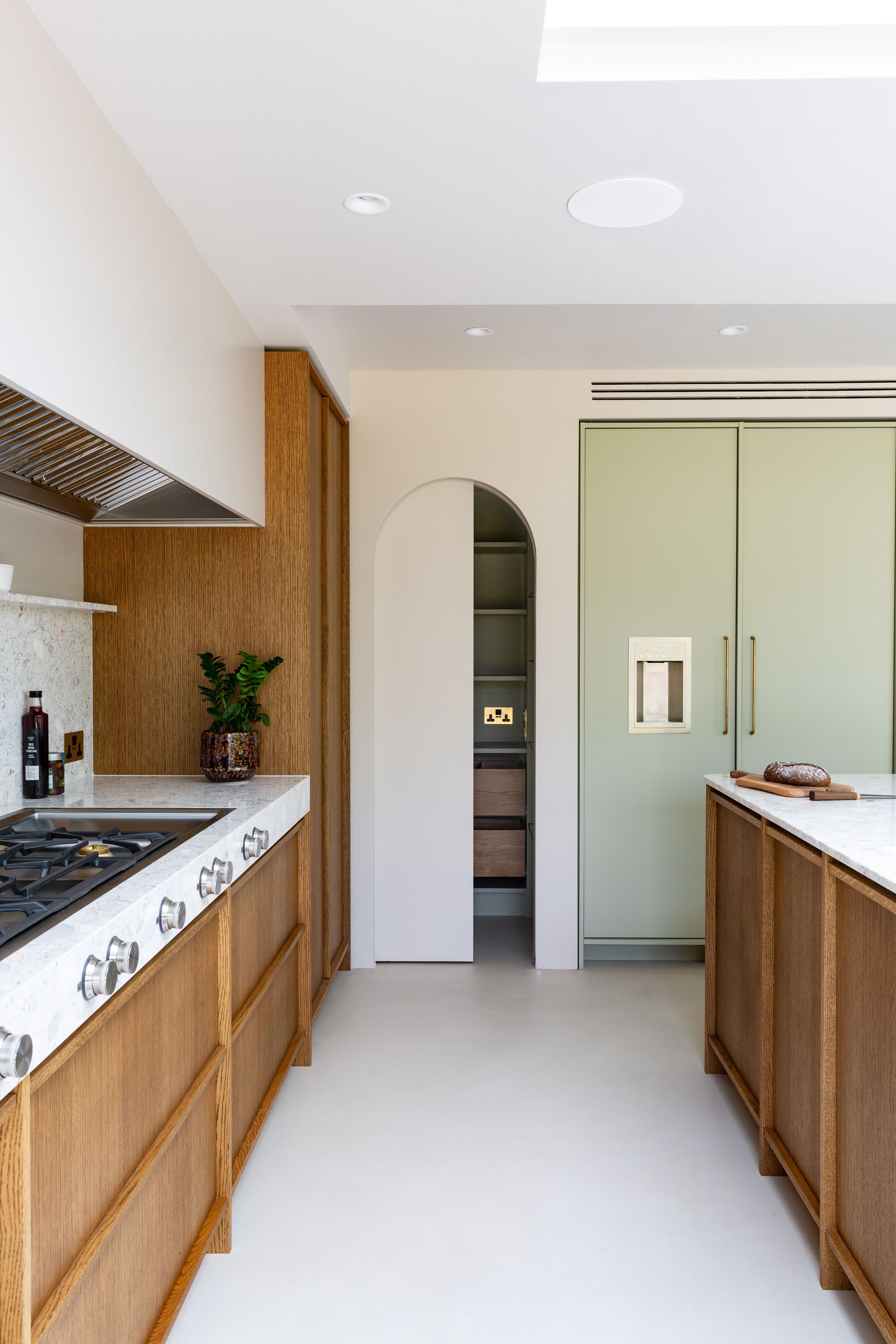 Image may contain: Indoors, Interior Design, Plant, Kitchen, Floor, and Flooring