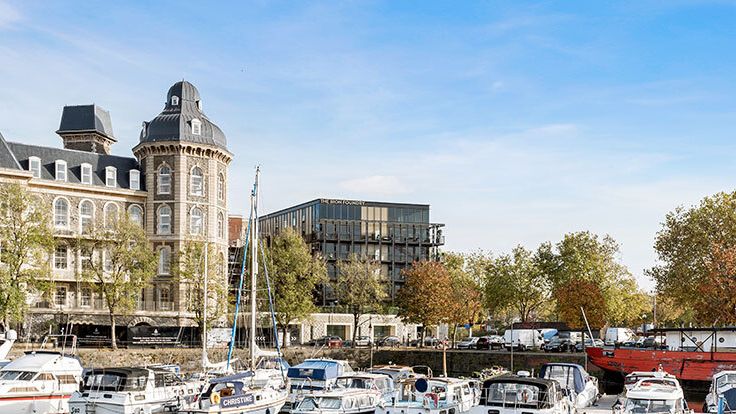 Image may contain: Water, Waterfront, Harbor, Pier, Marina, Architecture, Building, Cityscape, Urban, and Boat