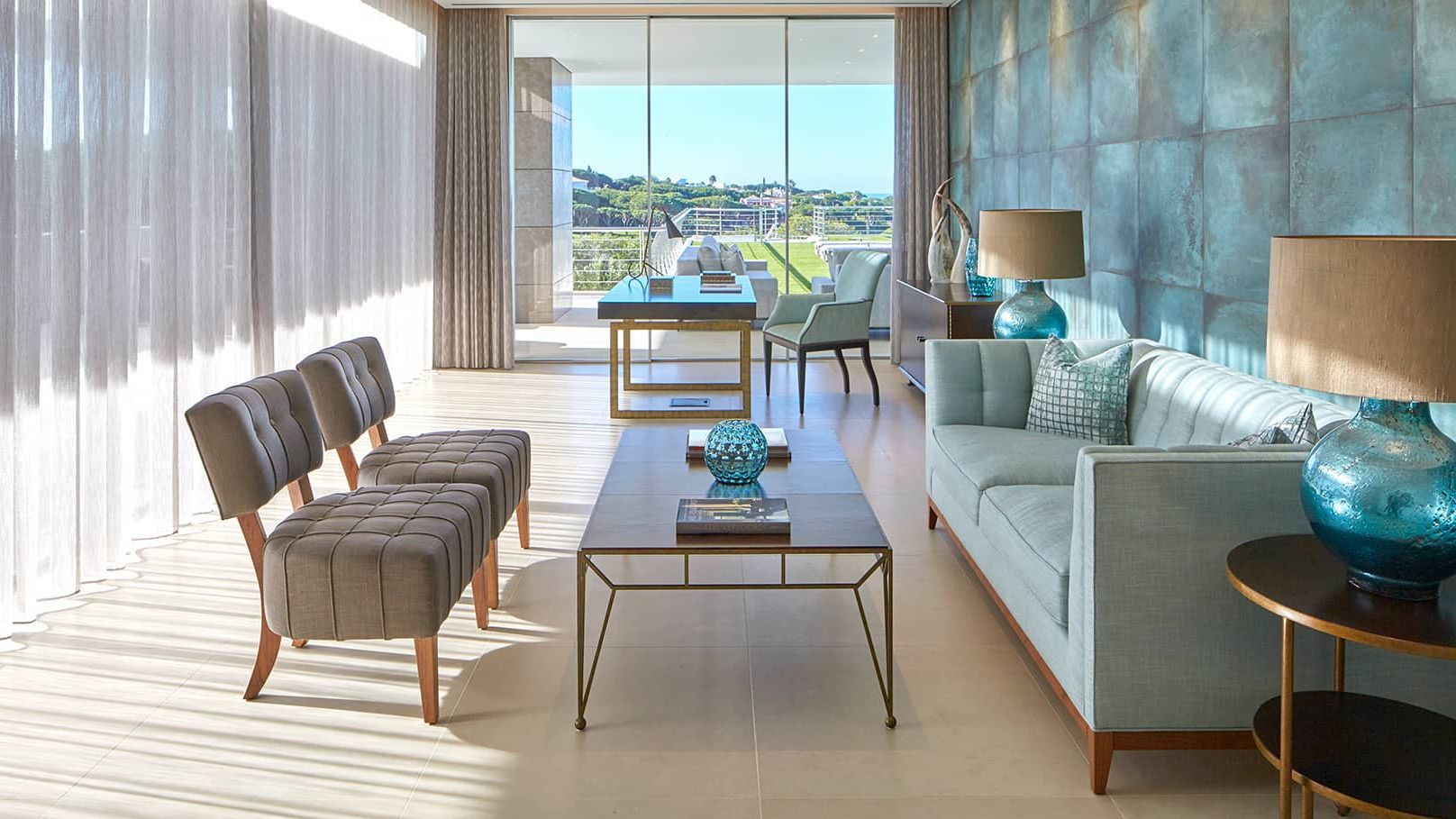 Image may contain: Book, Publication, Lamp, Furniture, Table, Architecture, Building, Indoors, Living Room, and Room