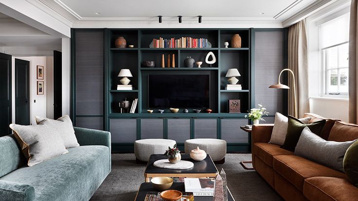 Image may contain: Home Decor, Indoors, Interior Design, Architecture, Building, Furniture, Living Room, Room, and Couch