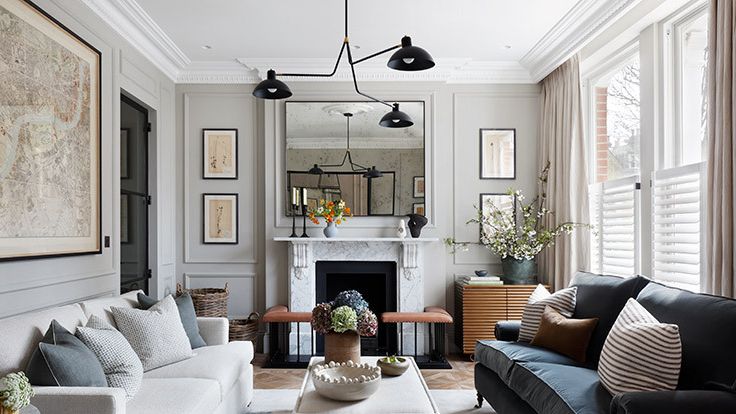 Image may contain: Home Decor, Couch, Furniture, Table, Architecture, Building, Indoors, Living Room, Room, Chair, and Art