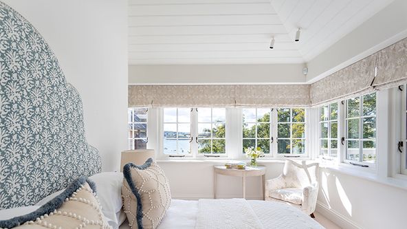 Image may contain: Window, Chair, Furniture, Home Decor, Cushion, Bed, Bay Window, Indoors, and Interior Design