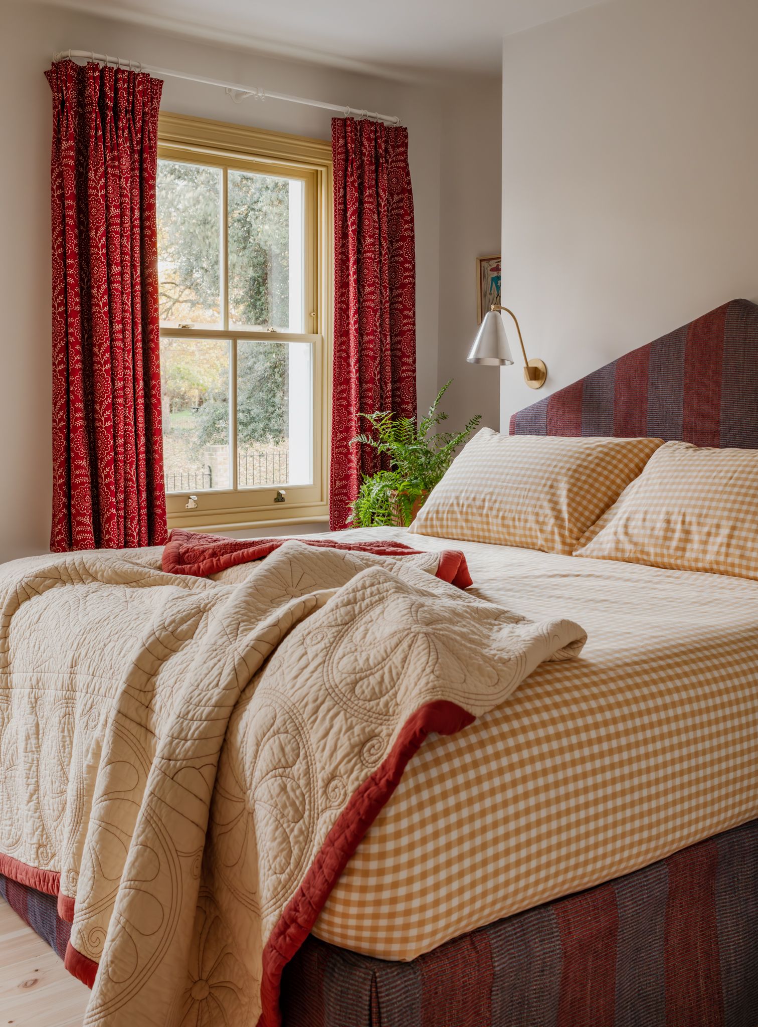 Image may contain: Lamp, Bed, Furniture, Indoors, Interior Design, Art, Painting, Bedroom, and Room