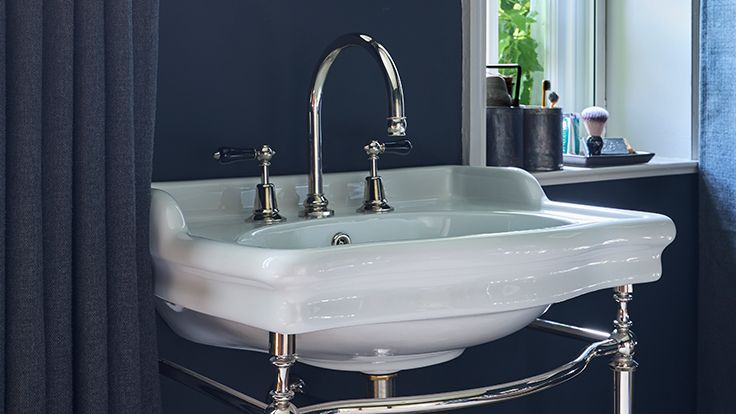 Image may contain: Sink, Sink Faucet, Basin, and Cup