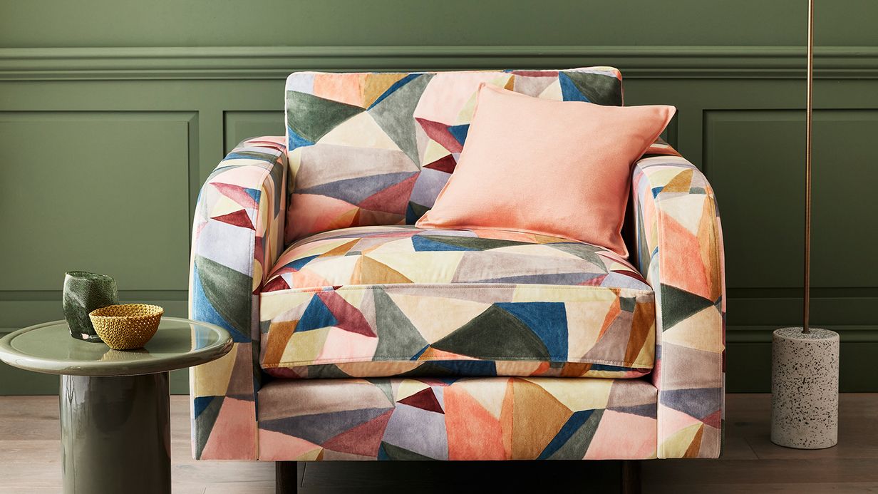 Image may contain: Furniture, Cushion, Home Decor, Chair, Desk, Table, and Armchair