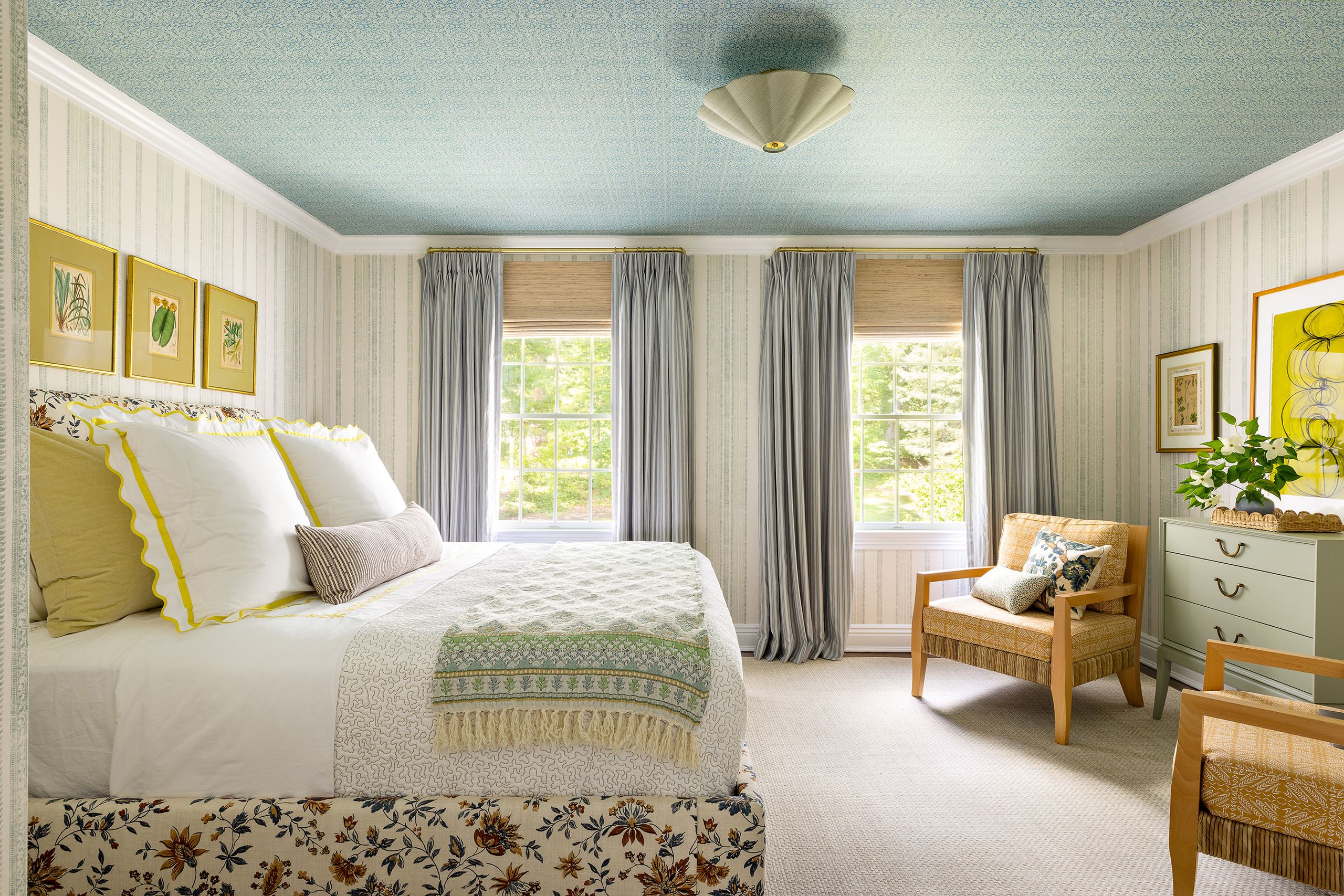 Image may contain: Lamp, Home Decor, Chair, Furniture, Plant, Bed, Cushion, Indoors, Interior Design, Art, and Painting