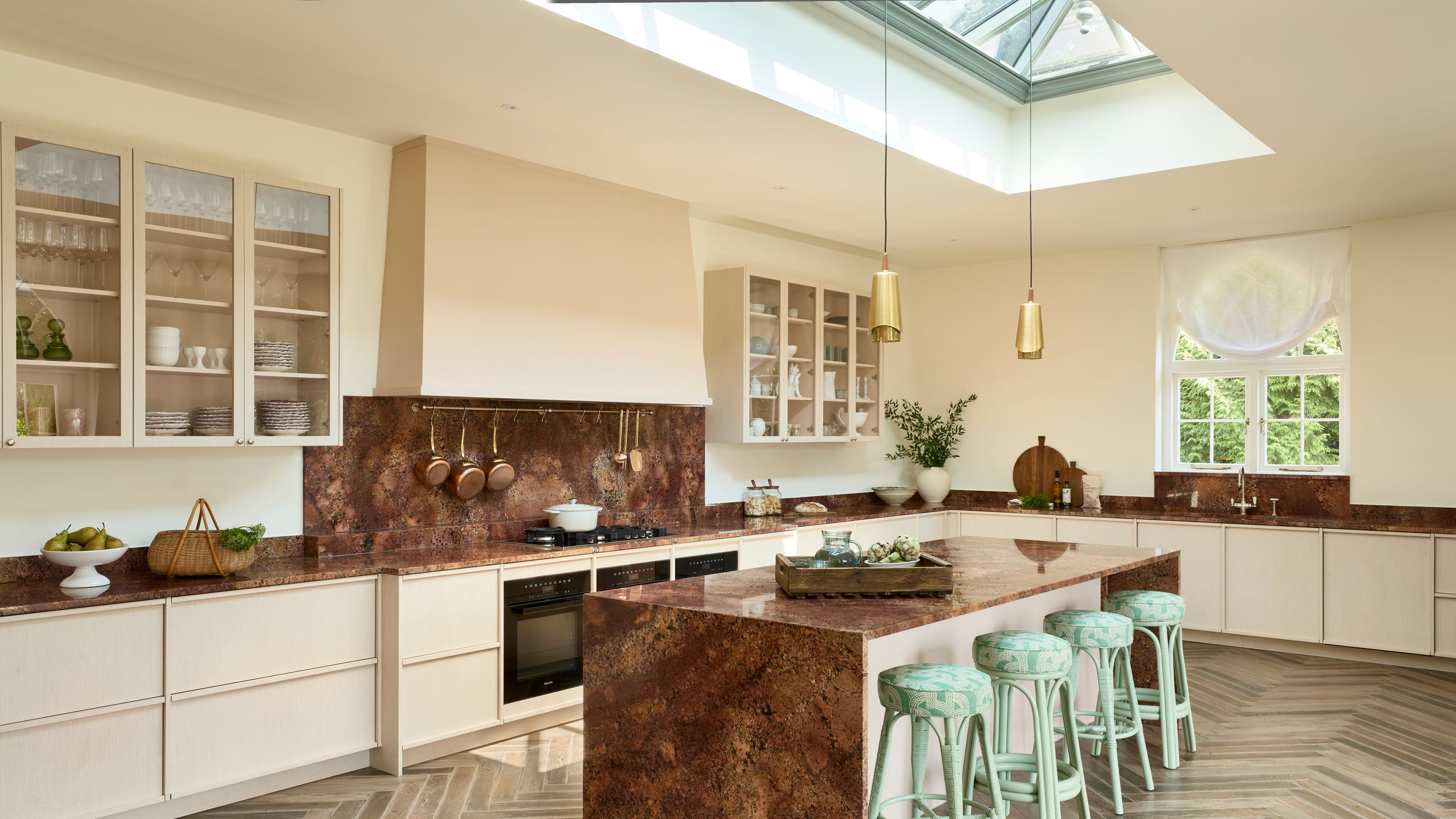 Image may contain: Indoors, Interior Design, Kitchen, Kitchen Island, Architecture, Building, Dining Room, and Dining Table