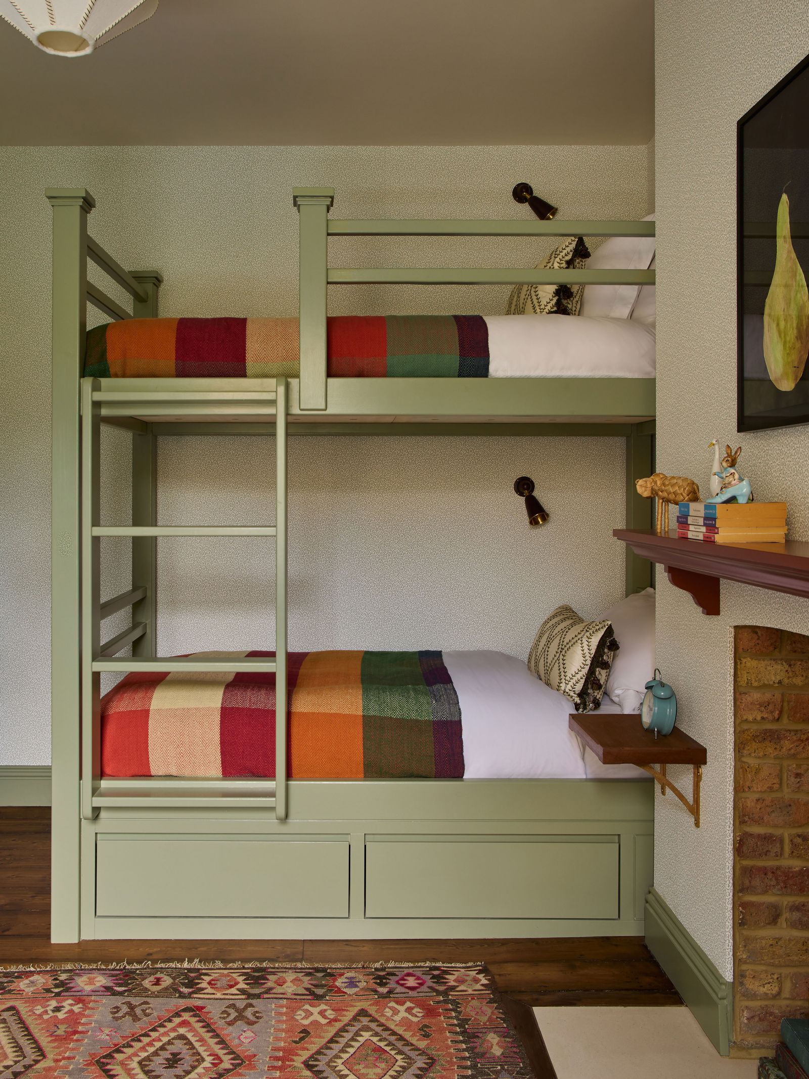 Image may contain Furniture Bed Lamp Bunk Bed Home Decor Art Painting Rug Bedroom Indoors Room and Architecture