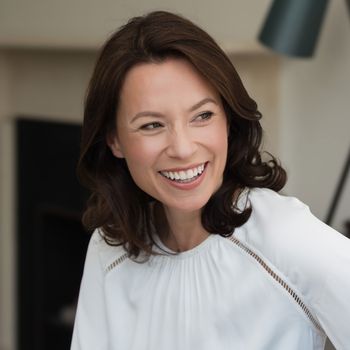 Image may contain: Face, Happy, Head, Person, Smile, Dimples, and Adult