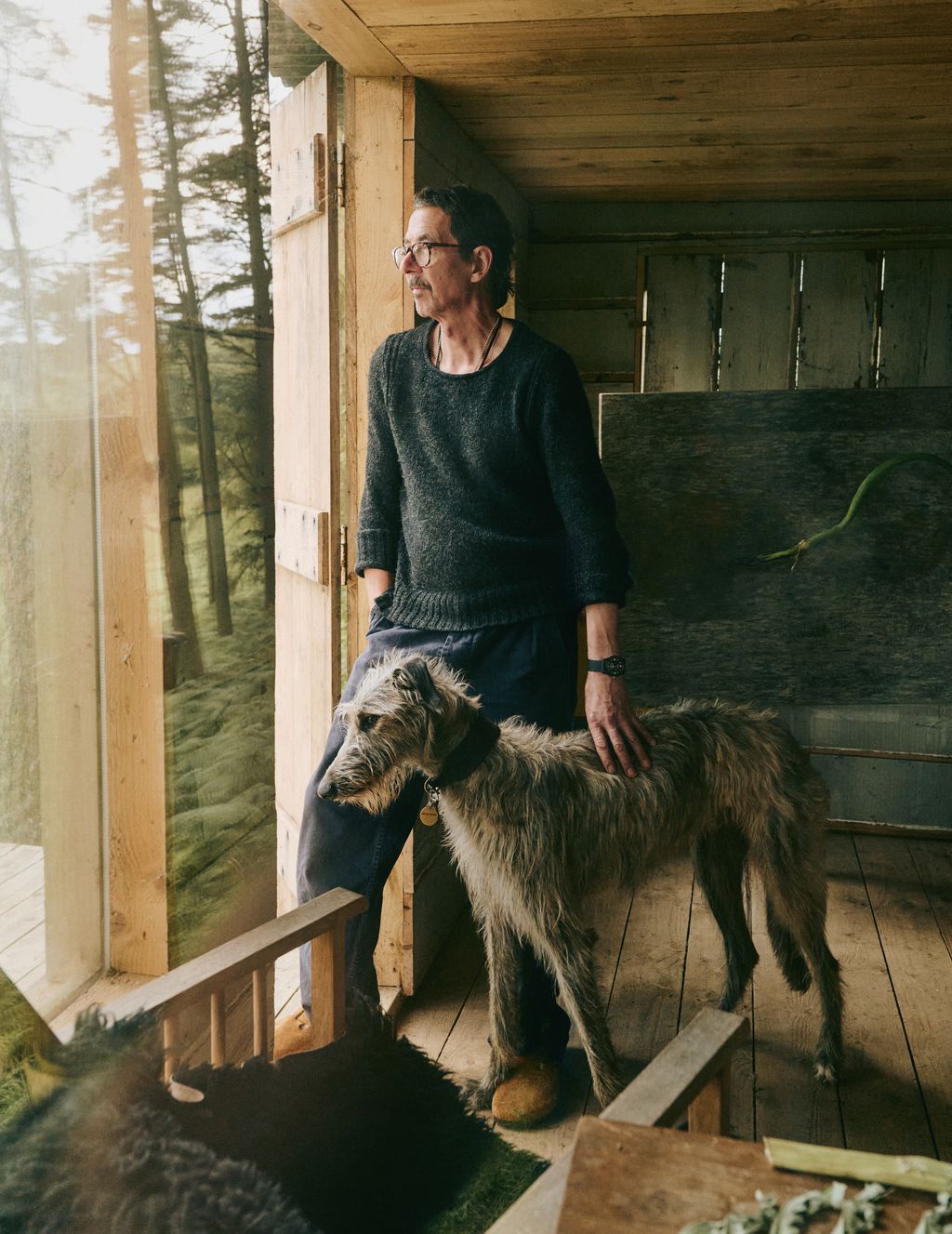 Image may contain Architecture Building Outdoors Shelter Face Head Person Photography Portrait Clothing and Pants