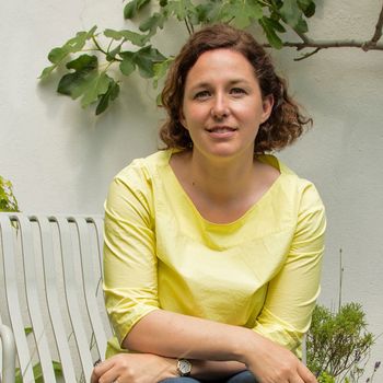 Image may contain: Max Lucado, Blouse, Clothing, Face, Head, Person, Photography, Portrait, Adult, Wristwatch, and Bench