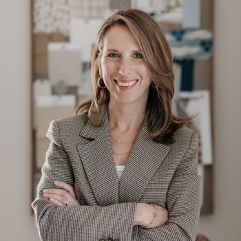 Image may contain: Face, Happy, Head, Person, Smile, Adult, Accessories, Bracelet, Jewelry, Dimples, Necklace, and Ring