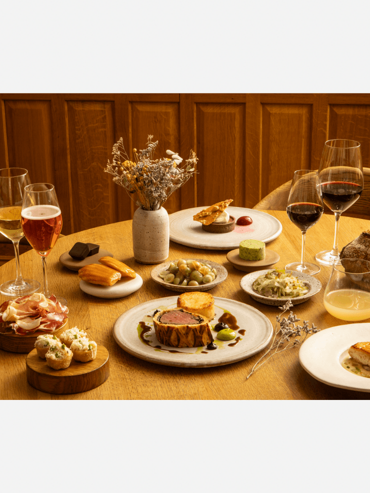 Image may contain: Food, Lunch, Meal, Glass, Dining Table, Furniture, Table, Brunch, Alcohol, Beverage, Liquor, and Wine