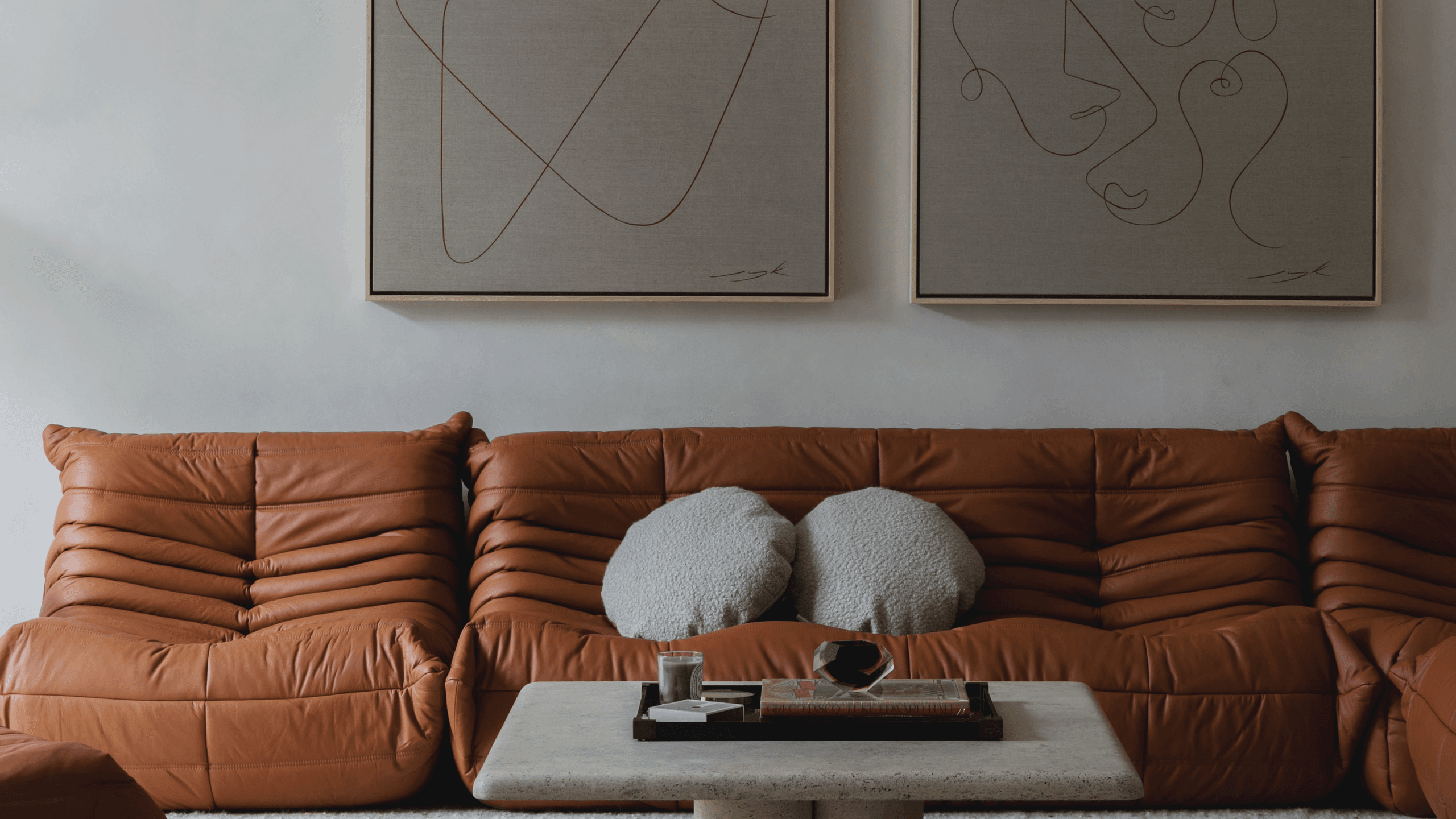 Image may contain: Couch, Furniture, Architecture, Building, Indoors, Living Room, Room, Interior Design, and Table