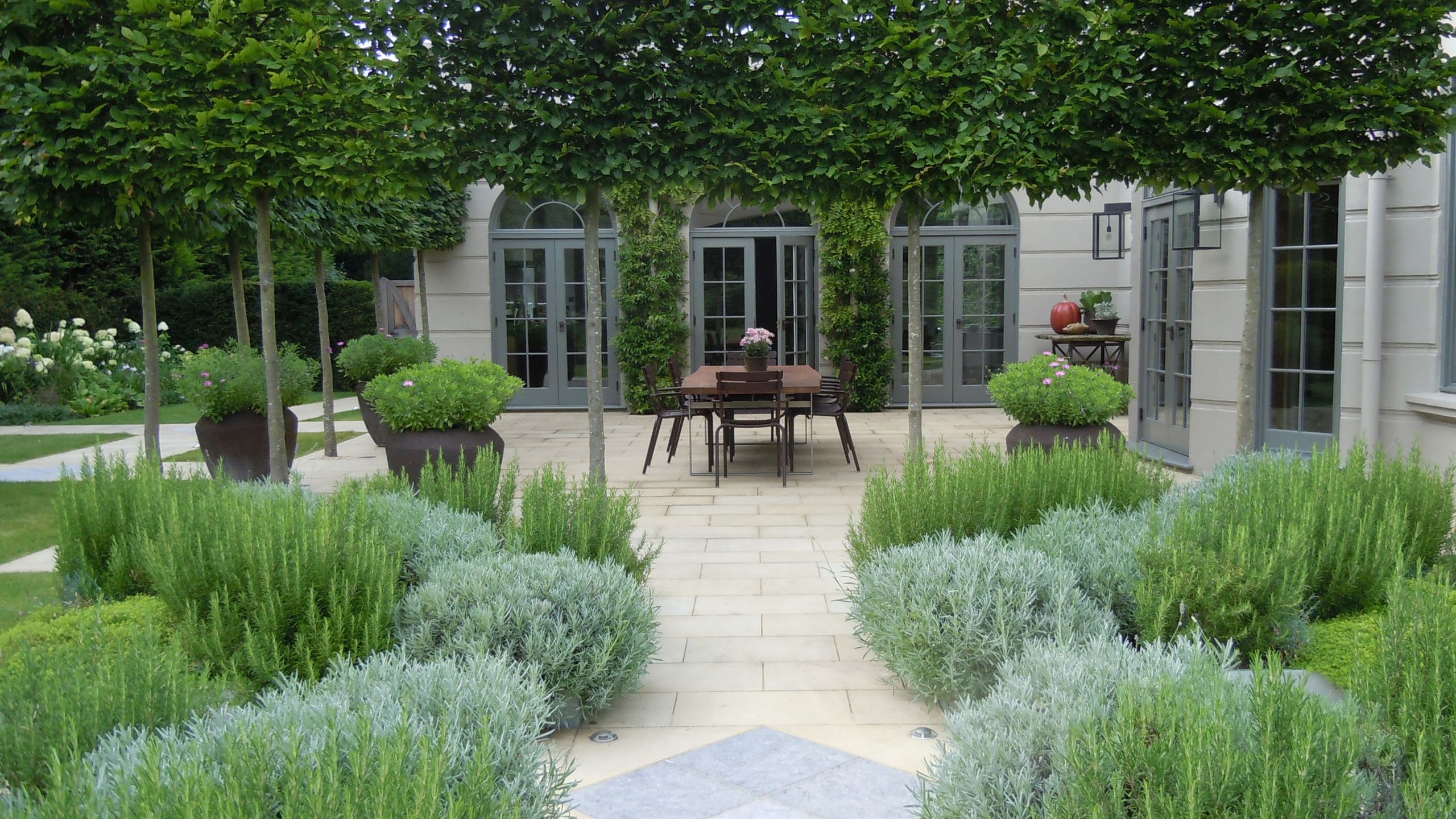 Image may contain: Backyard, Nature, Outdoors, Yard, Garden, Grass, Plant, Herbal, Herbs, Vegetation, and Architecture