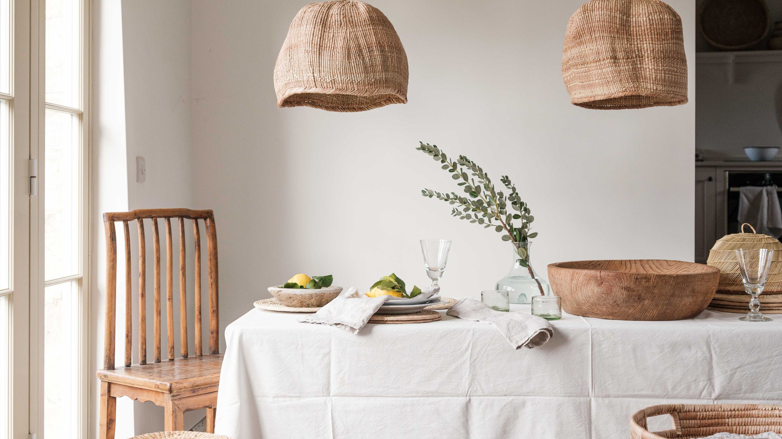 Image may contain: Architecture, Building, Dining Room, Dining Table, Furniture, Indoors, Room, Table, Tablecloth, and Chair