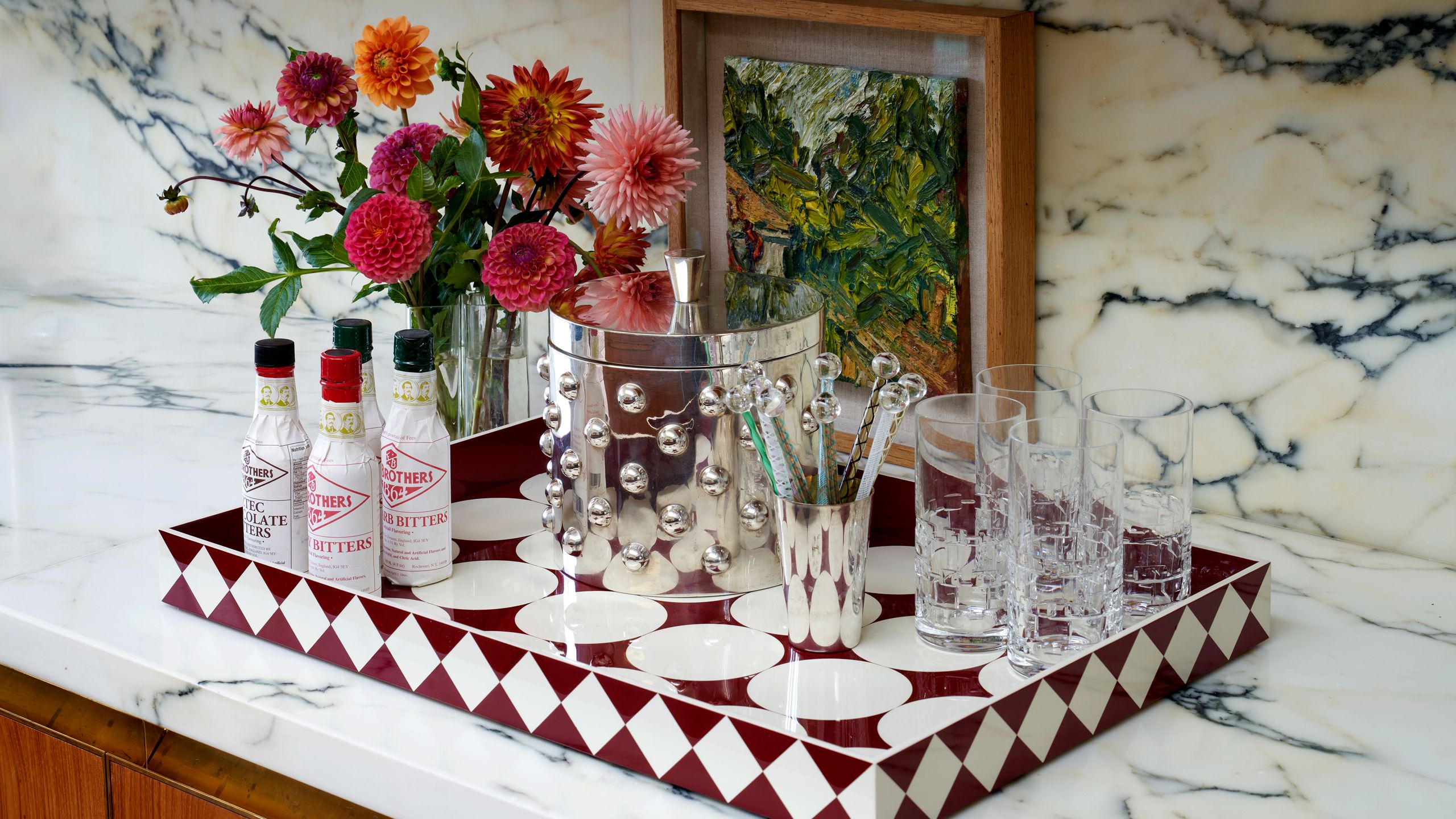 Image may contain: Cup, Furniture, Table, Tabletop, Plate, Pottery, Flower, Plant, Flower Arrangement, Art, Painting, and Jar