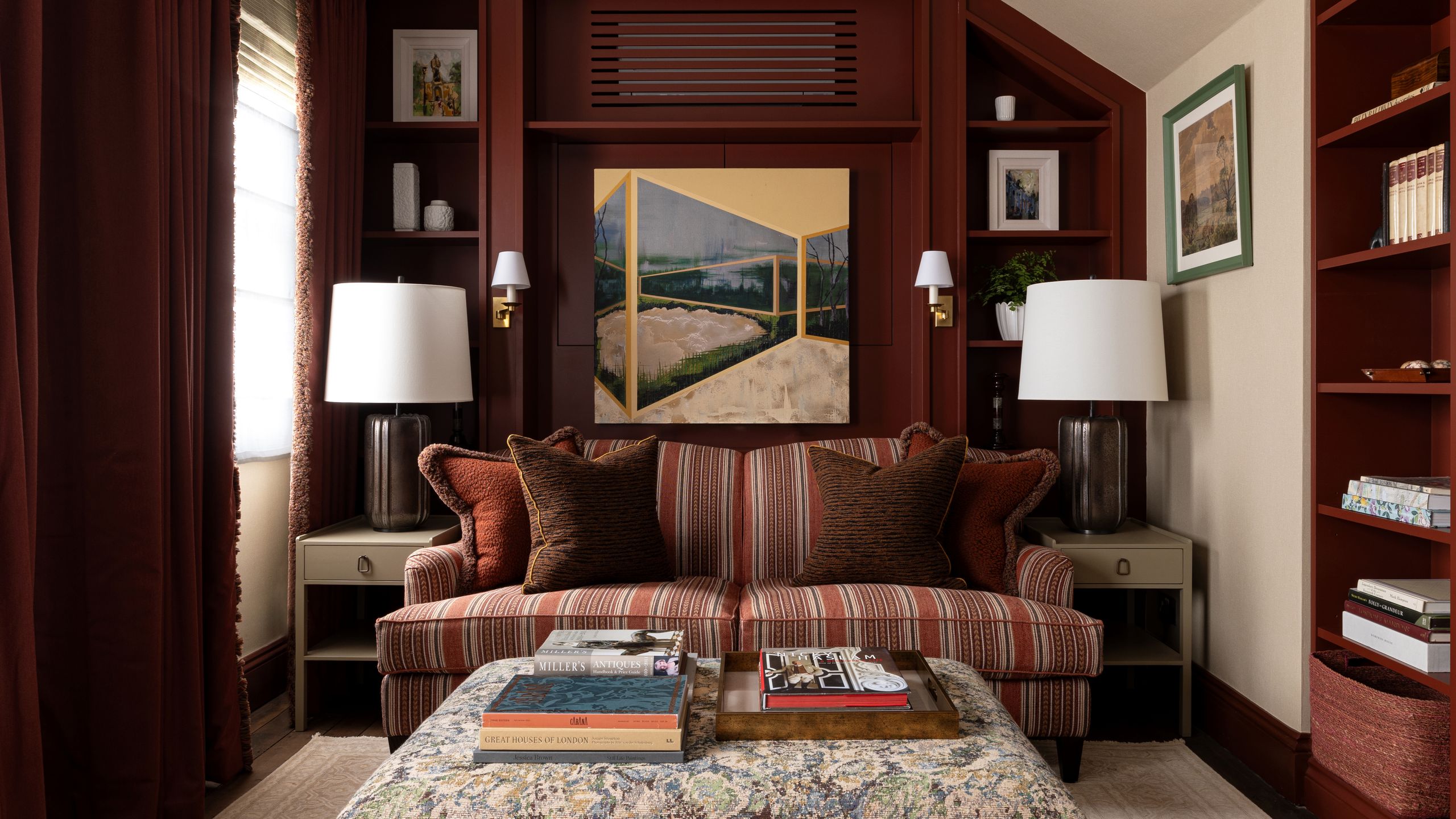 Image may contain: Lamp, Book, Publication, Home Decor, Architecture, Building, Furniture, Indoors, Living Room, and Room