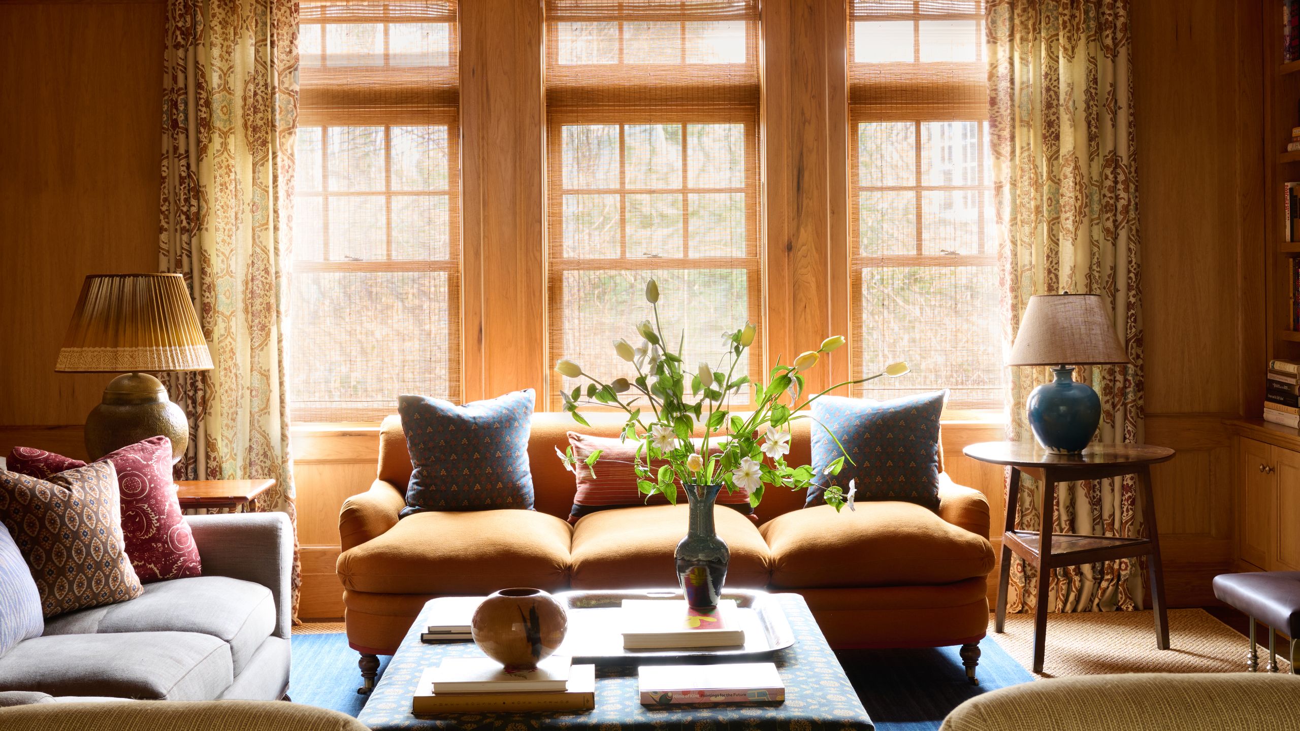 Image may contain: Lamp, Home Decor, Couch, Furniture, Architecture, Building, Indoors, Living Room, and Room