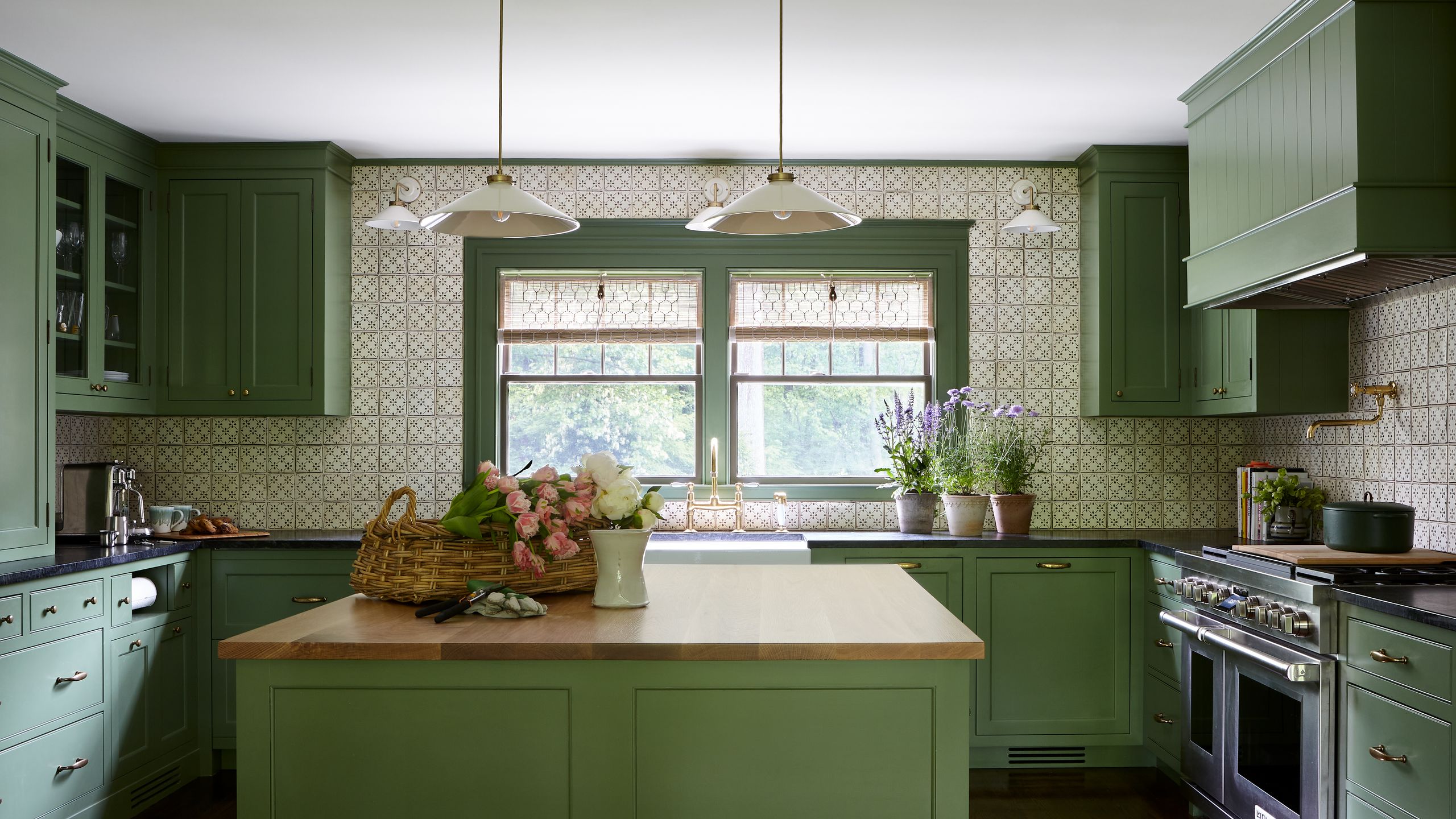 Image may contain: Indoors, Interior Design, Kitchen, Lamp, and Kitchen Island