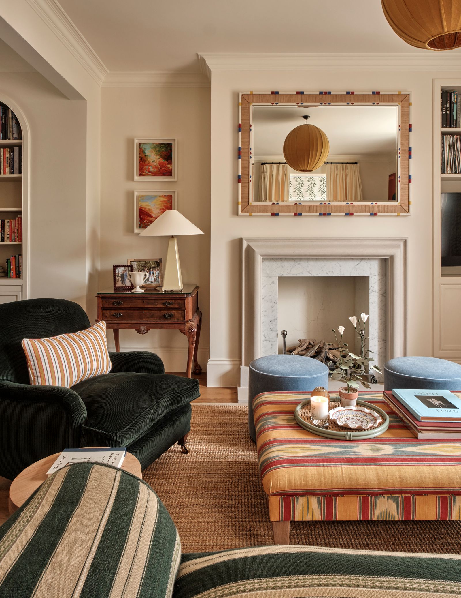 Image may contain Home Decor Lamp Furniture Art Painting Couch and Candle