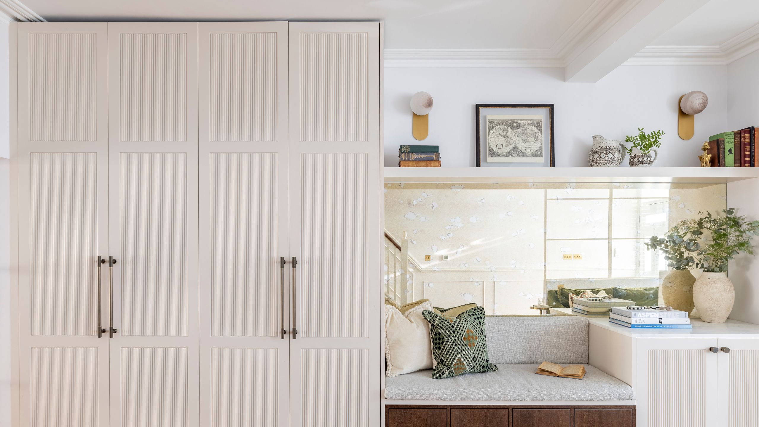 Image may contain: Indoors, Interior Design, Plant, Furniture, Home Decor, Closet, Cupboard, and Bed