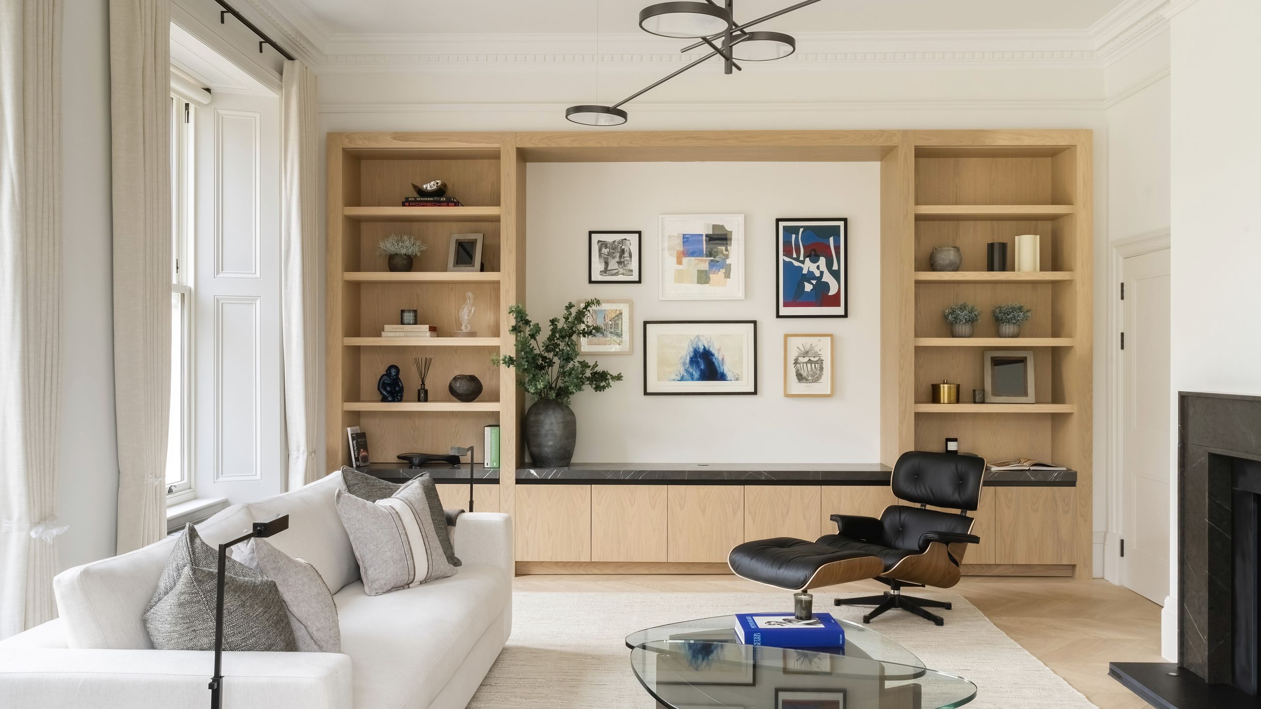 Image may contain: Home Decor, Couch, Furniture, Indoors, Plant, Architecture, Building, Living Room, and Room