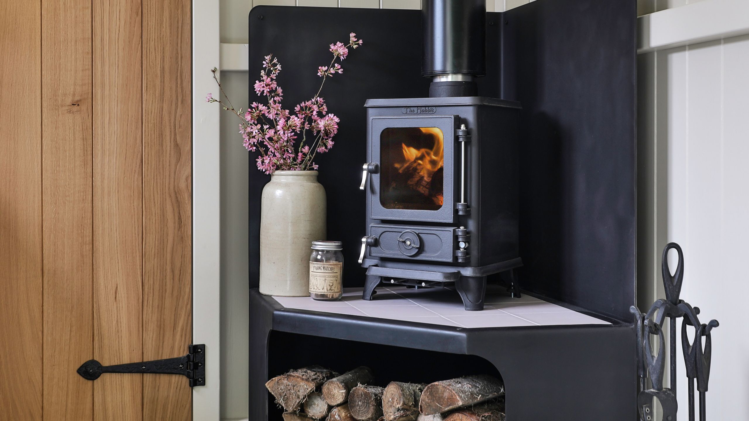 Image may contain: Indoors, Interior Design, Fireplace, Device, Appliance, Electrical Device, and Oven