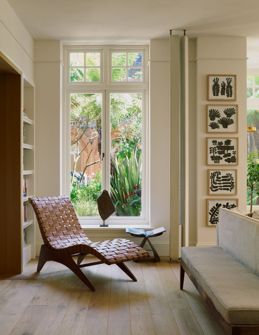 Image may contain Book Publication Chair Furniture Window French Window Couch Art and Painting