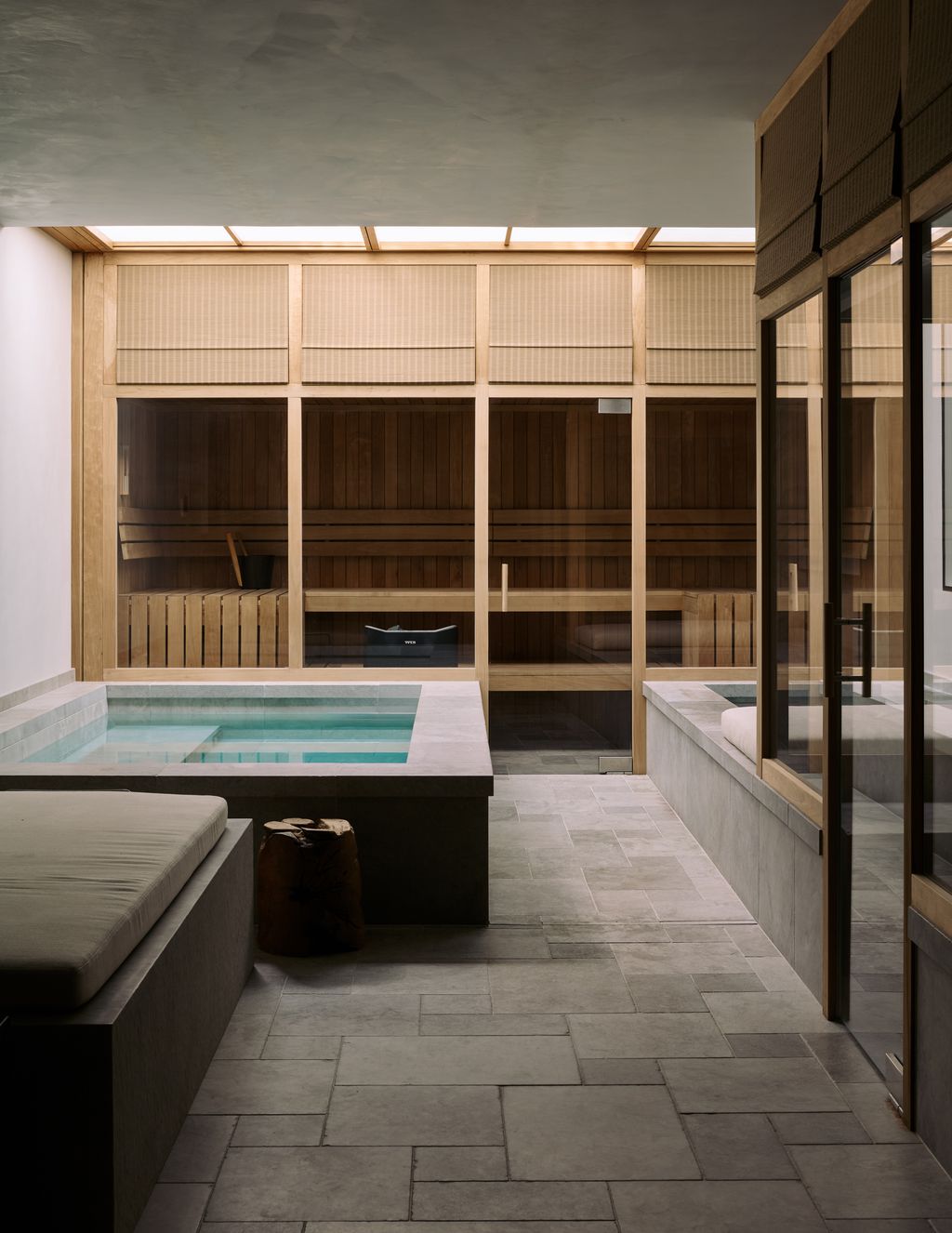 Image may contain Indoors Interior Design Floor Tub Hot Tub Bathing Bench and Furniture