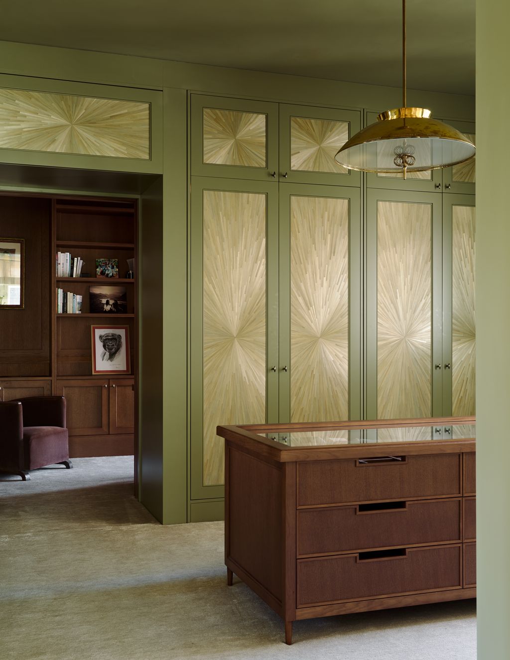 Image may contain Indoors Interior Design Lamp Chandelier Corner Cabinet Furniture Closet Cupboard and Art