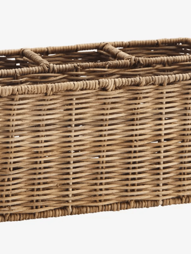 Image may contain Basket Crib Furniture Infant Bed and Woven