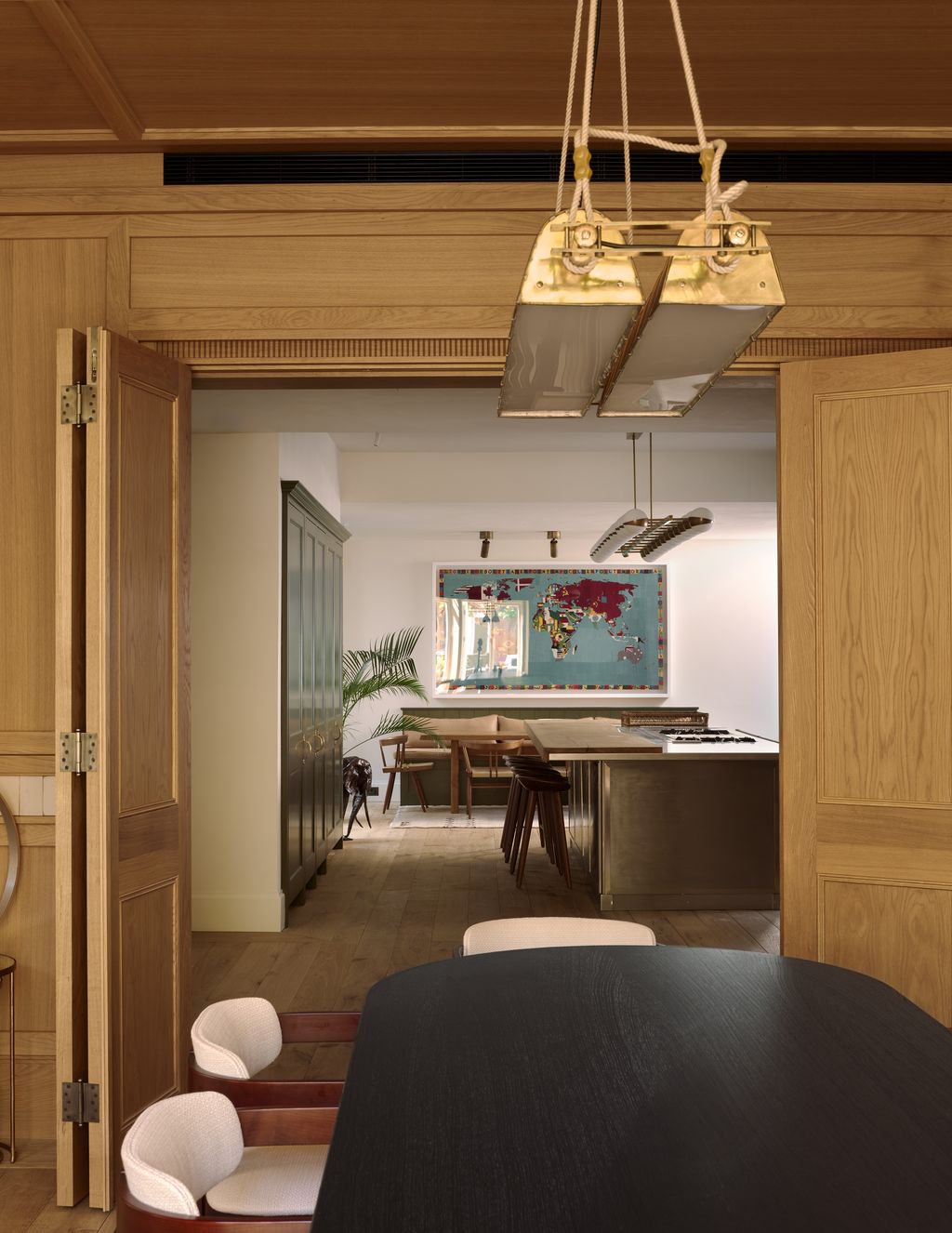 Image may contain Indoors Interior Design Architecture Building Dining Room Dining Table Furniture Room and Table