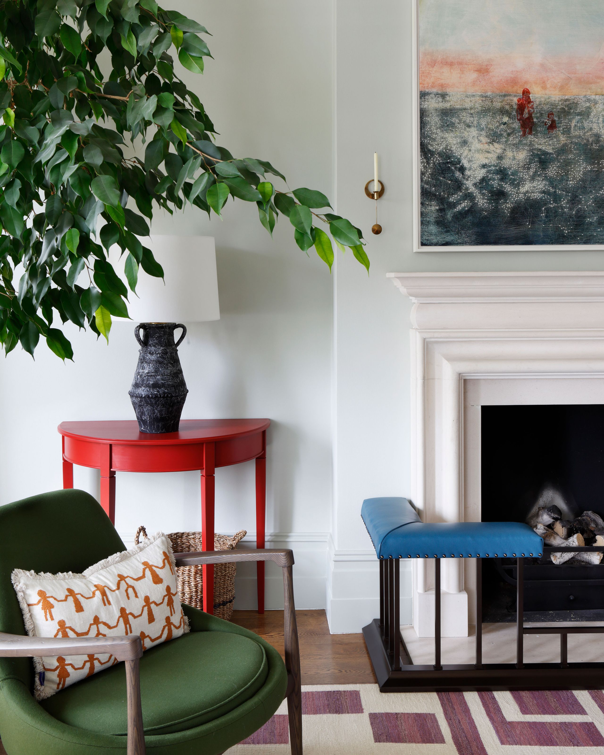 Image may contain: Cushion, Home Decor, Chair, Furniture, Person, Pillow, Art, and Painting