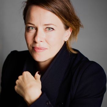 Image may contain: Face, Head, Person, Photography, Portrait, Body Part, Finger, Hand, and Adult