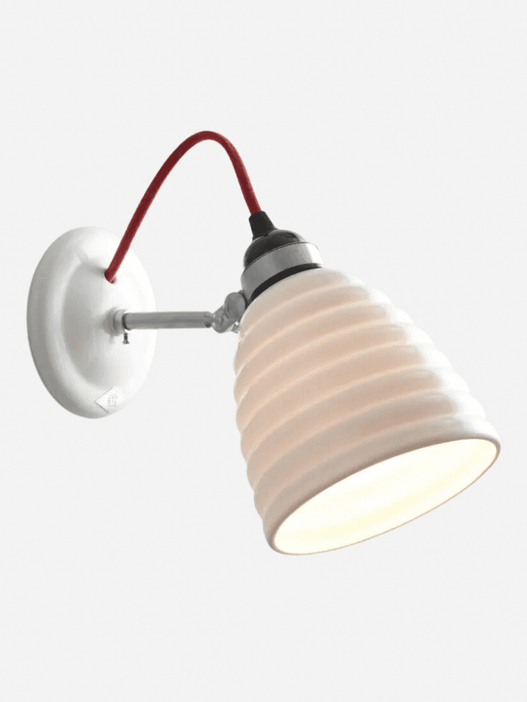 Image may contain Lamp Lighting and Lampshade