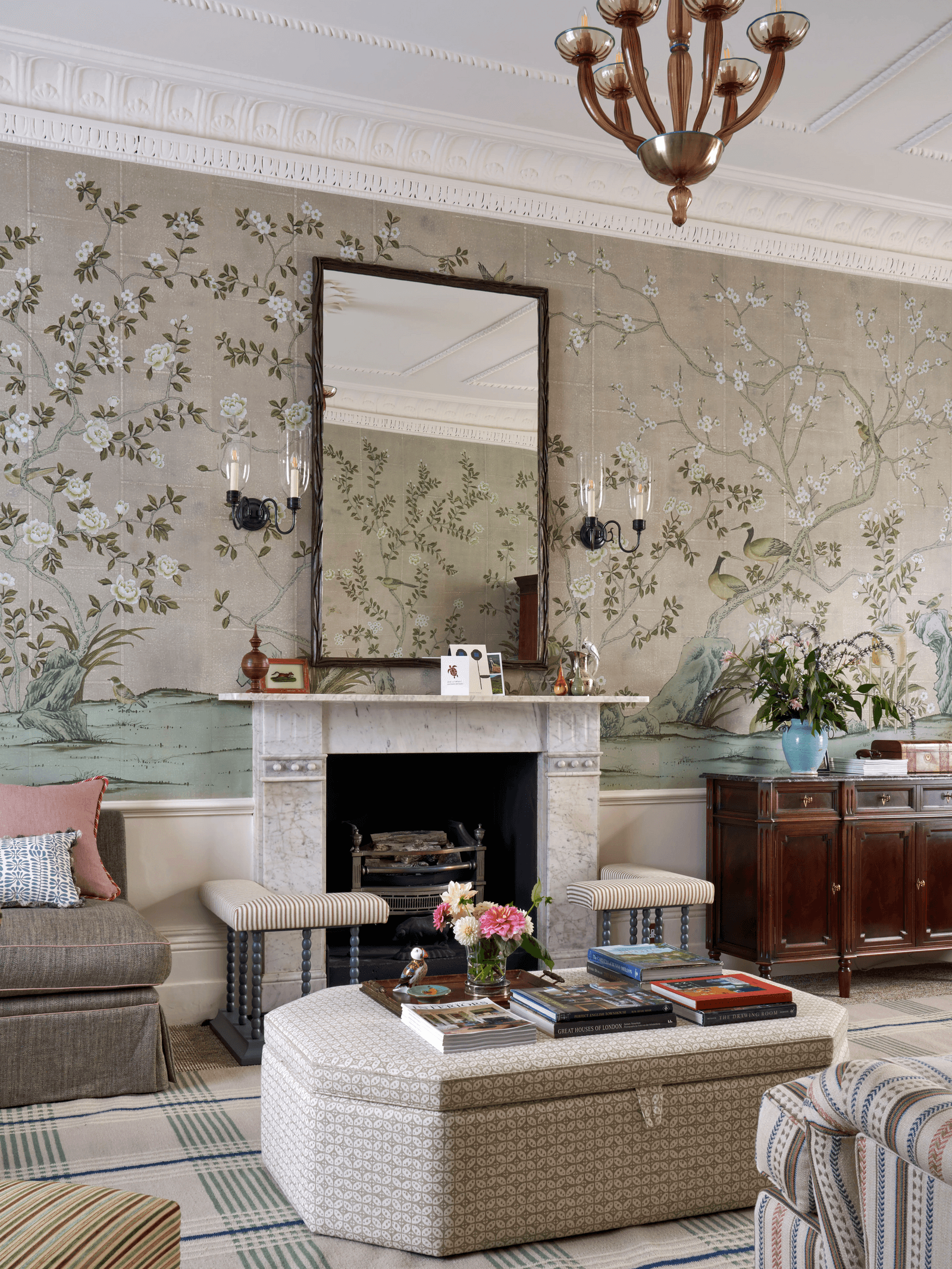 Image may contain Architecture Building Furniture Indoors Living Room Room Home Decor Interior Design and Chandelier