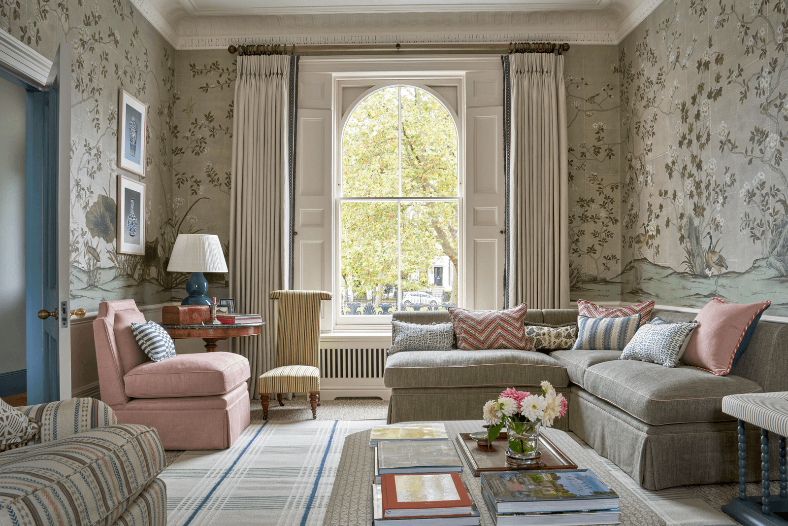 Image may contain Home Decor Architecture Building Furniture Indoors Living Room Room Couch Book and Publication