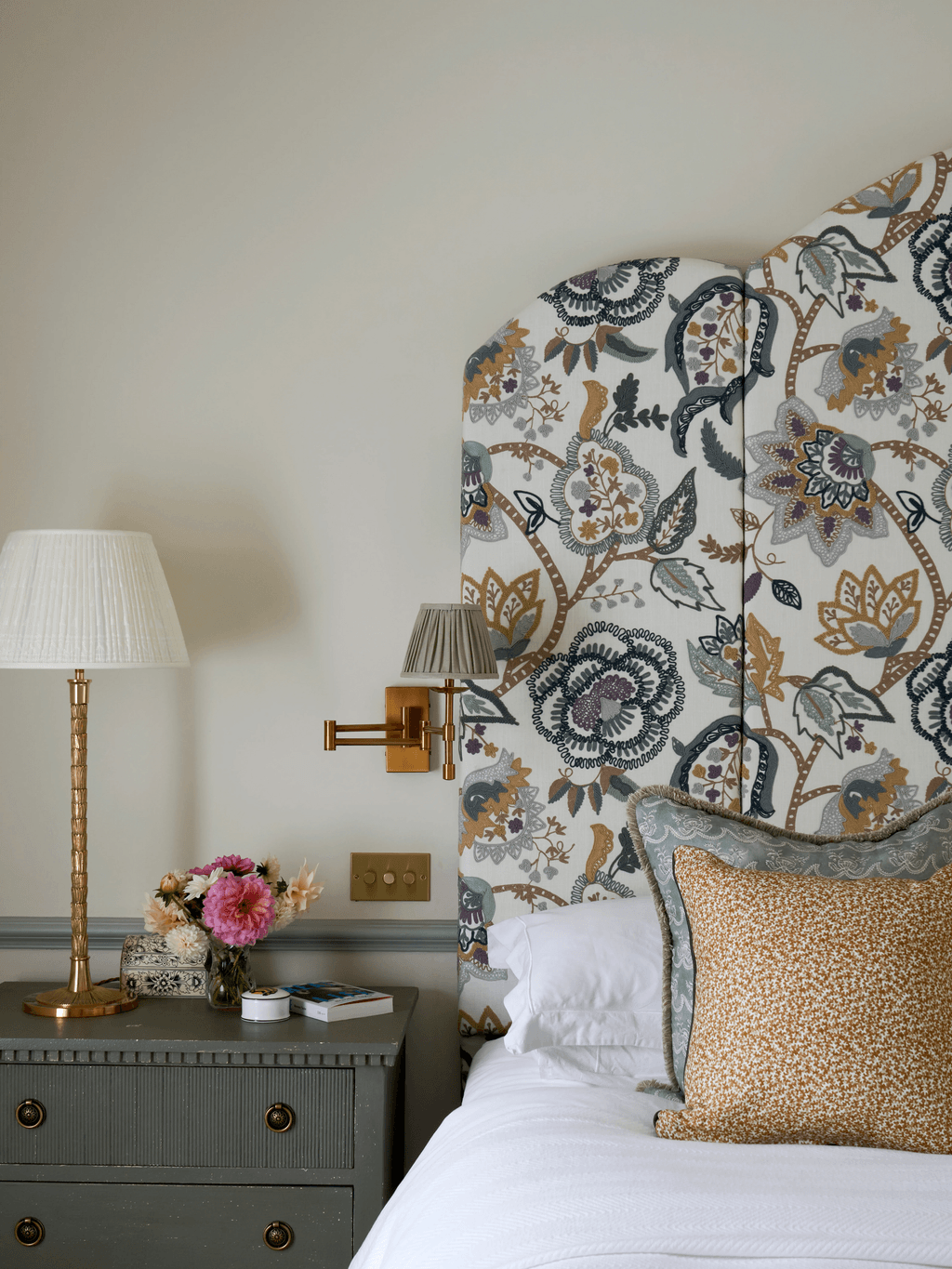 Image may contain Cushion Home Decor Lamp Indoors Interior Design Table Lamp Pillow Flower and Flower Arrangement