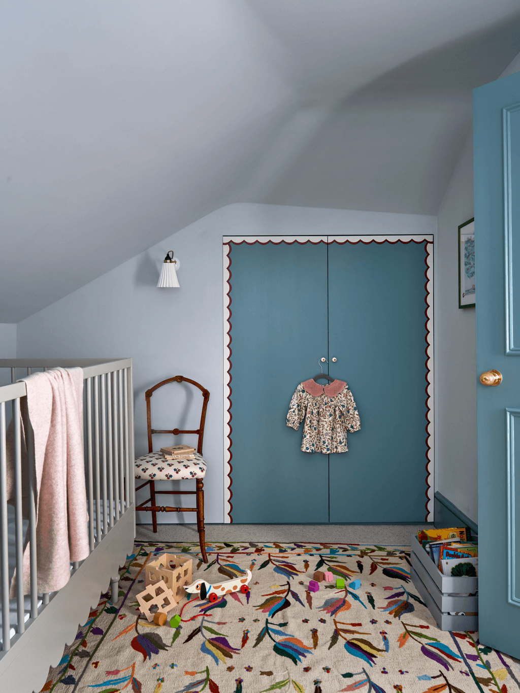 Image may contain Indoors Home Decor Nursery Room Crib Furniture Infant Bed Chair Architecture and Building