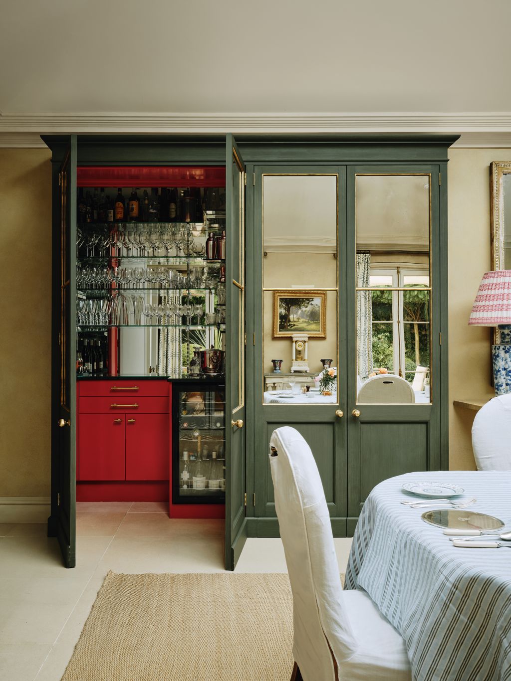 Image may contain Door Art Painting Lamp Shelf Indoors Interior Design Plate Chair Furniture Cutlery and Fork