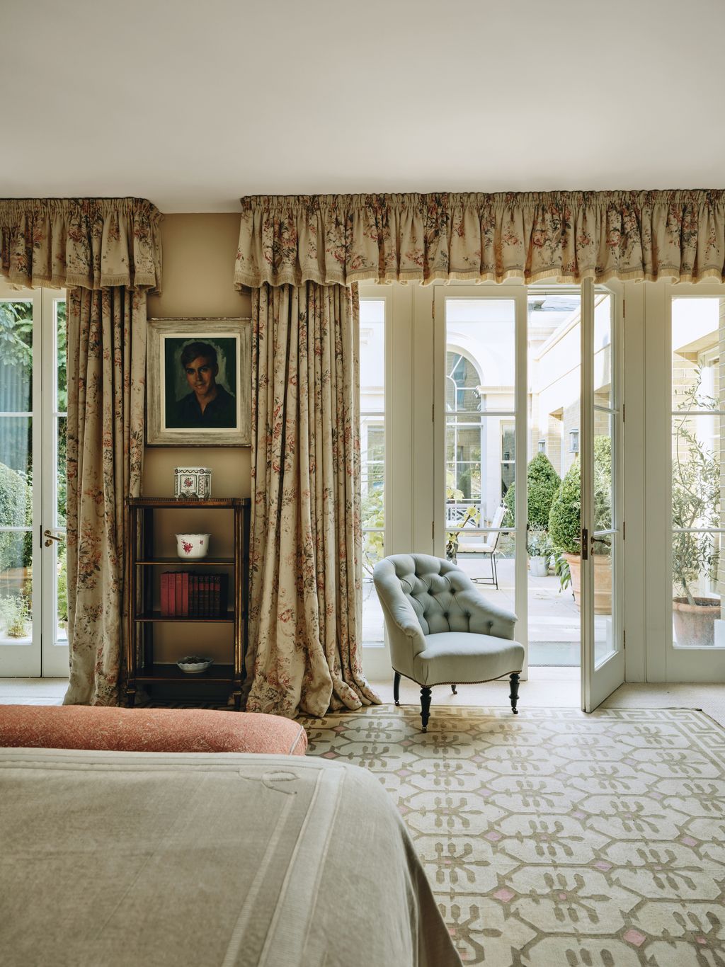 Image may contain Art Painting Chair Furniture Person French Window Window Plant Home Decor and Couch