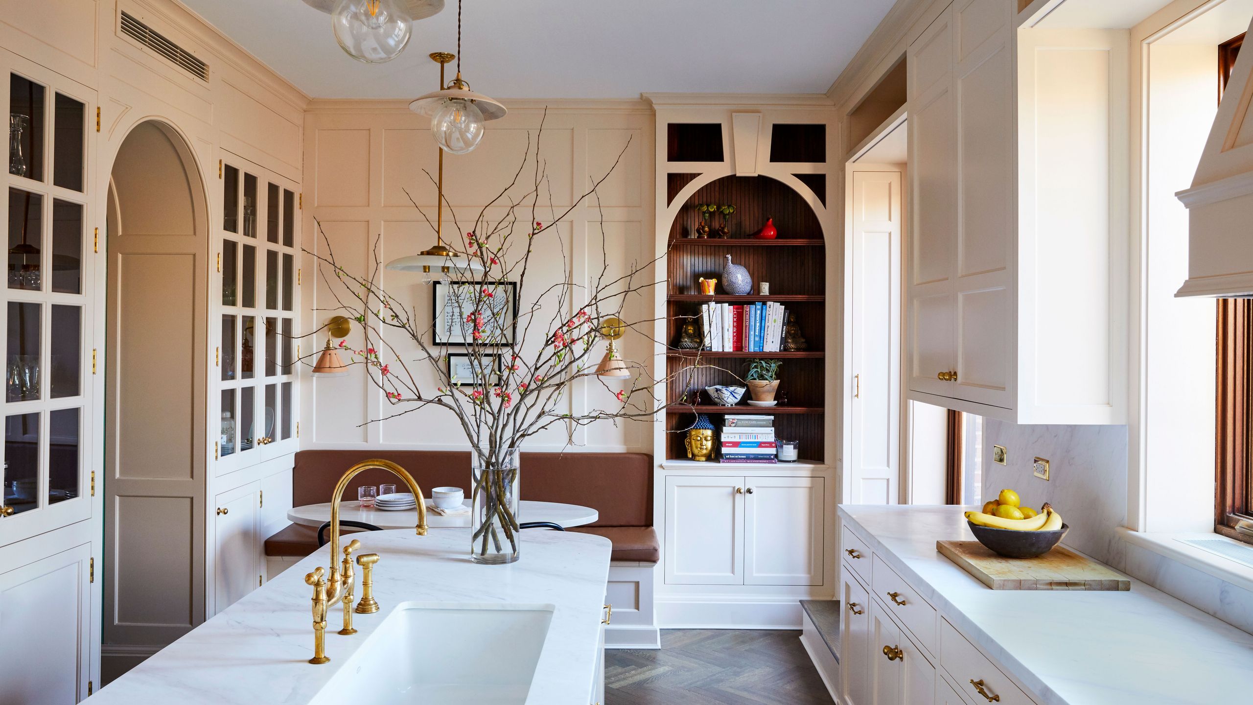 Image may contain: Indoors, Interior Design, Plant, Sink, Sink Faucet, Cup, Lamp, Home Decor, Art, Painting, and Kitchen