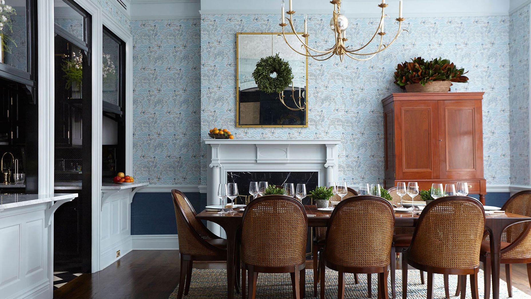 Image may contain: Architecture, Building, Dining Room, Dining Table, Furniture, Indoors, Room, Table, Chandelier, and Lamp