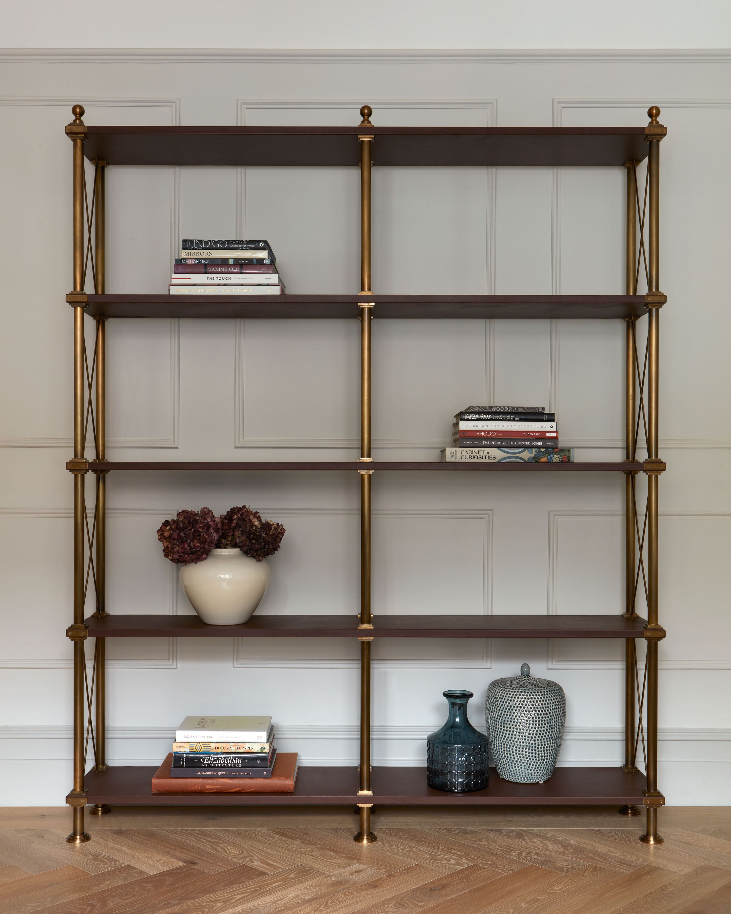 Image may contain: Furniture, Bookcase, Plant, Hardwood, and Wood