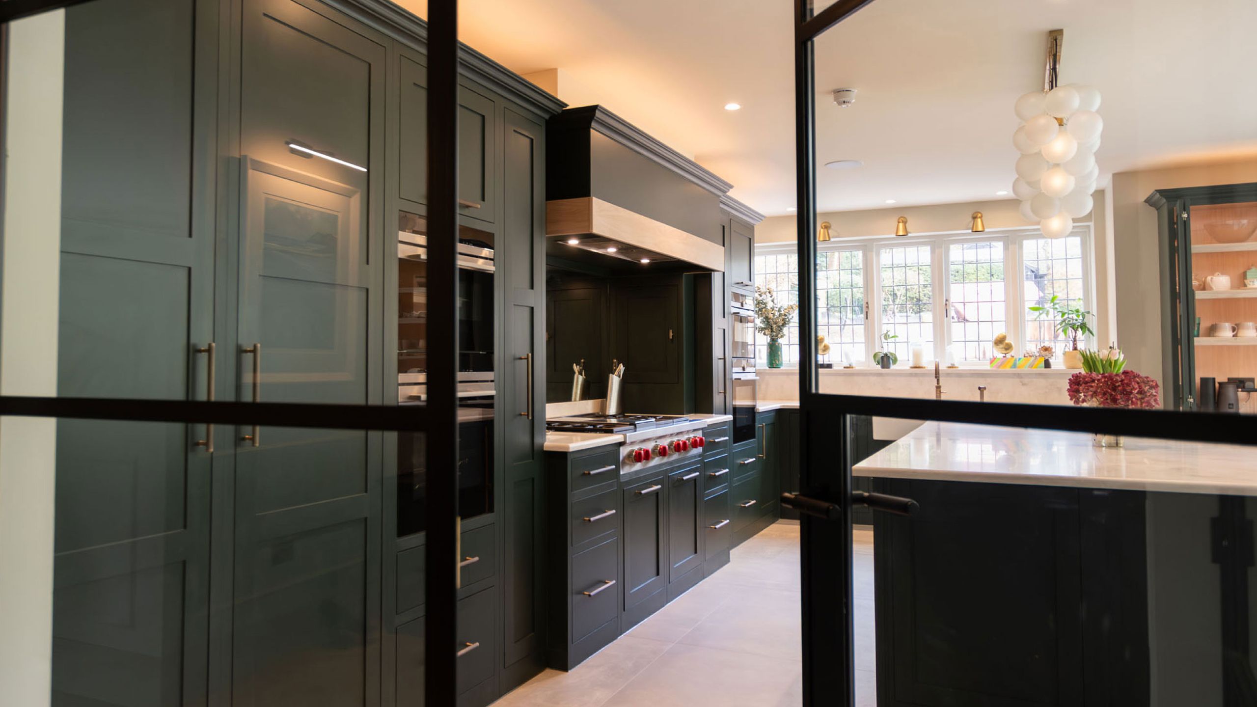 Image may contain: Indoors, Interior Design, Kitchen, and Kitchen Island