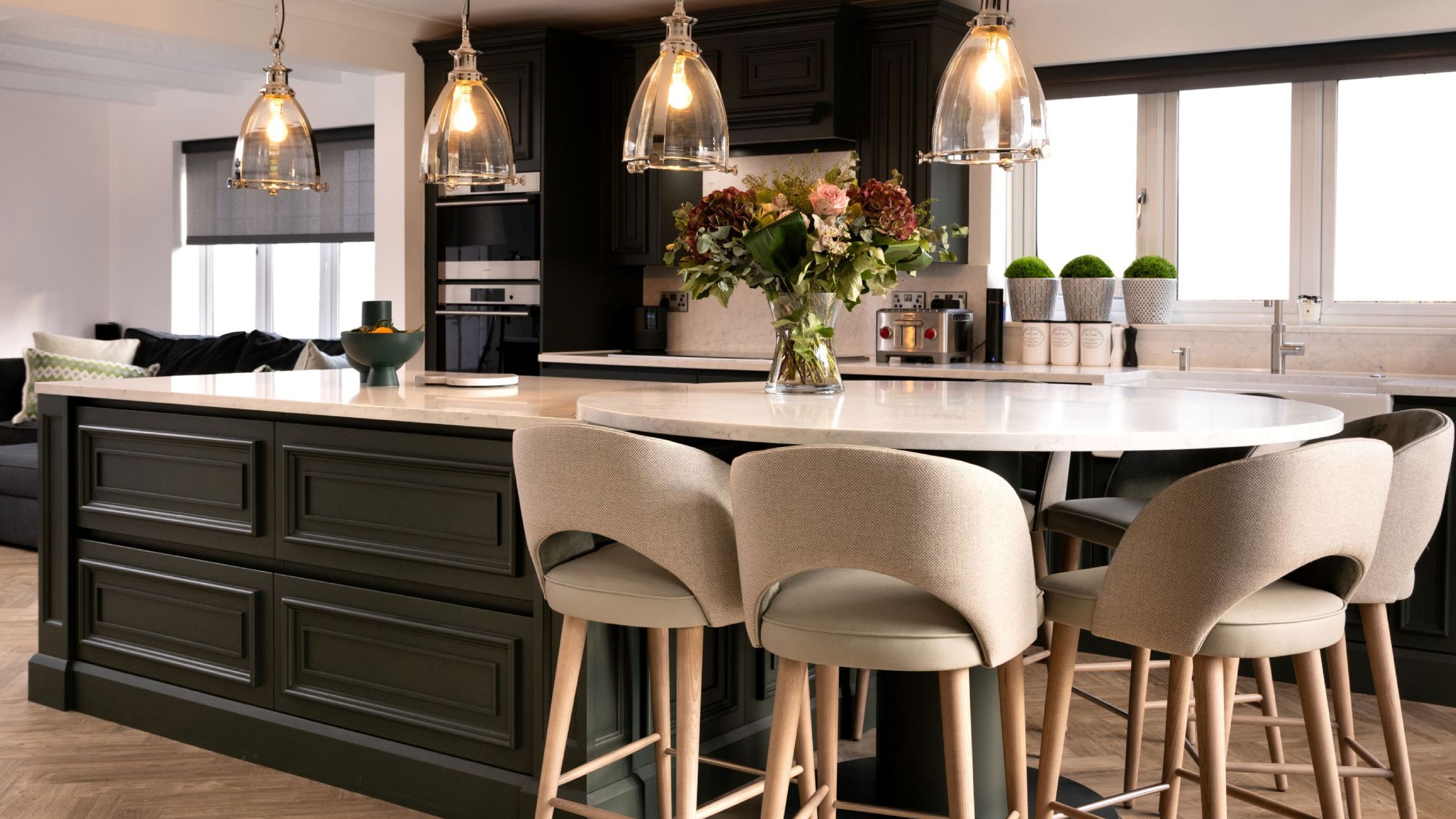 Image may contain: Indoors, Kitchen, Kitchen Island, Architecture, Building, Dining Room, Dining Table, Furniture, and Room